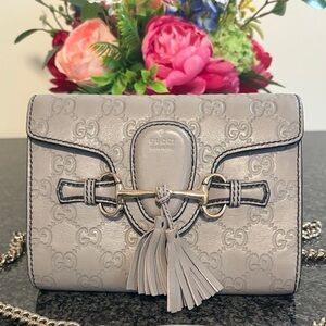 Gucci Silver Embossed Clutch with Tassel